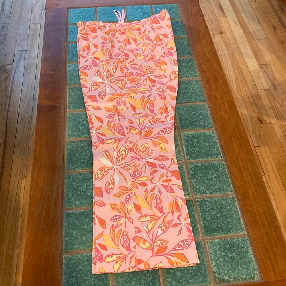 Pink floral print pants with beaded embellishments by Jade Melody Tam, size 10